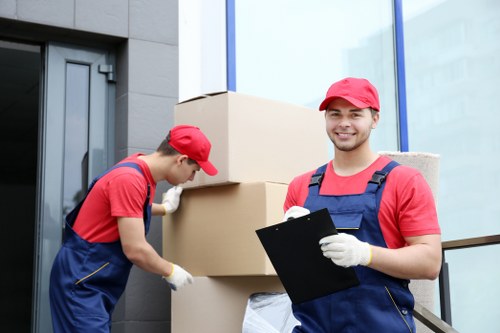 Man and van loading furniture for a local Hammersmith move