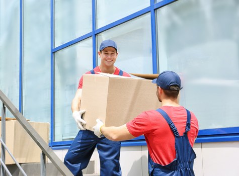 Packing boxes and household items in a Hammersmith home move