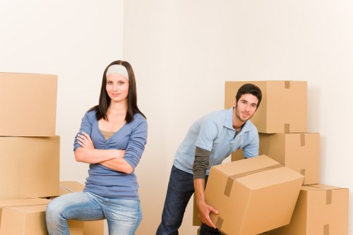Staff preparing files and technology for a business relocation
