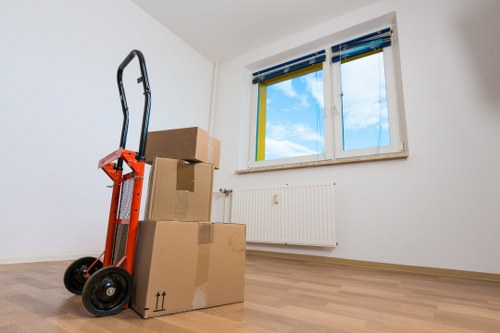 Local furniture pick-up service loading items into a van