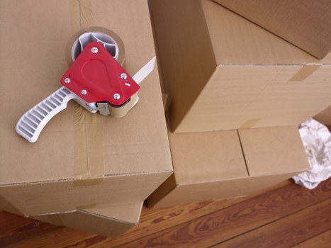 Professional house removalists loading belongings for a West London move