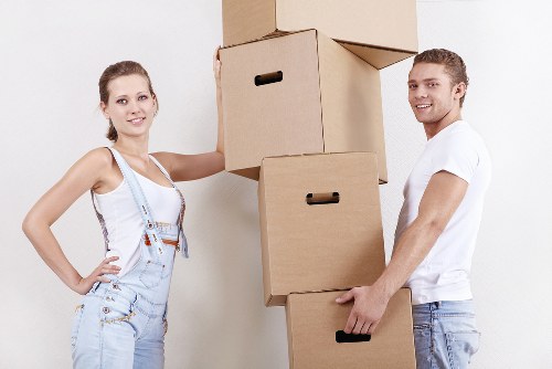 Removal team loading furniture on moving day
