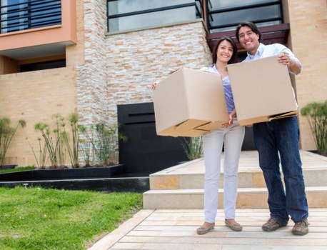 Professional van loading household boxes in Hammersmith