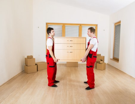 Loading furniture into a moving truck in Hammersmith